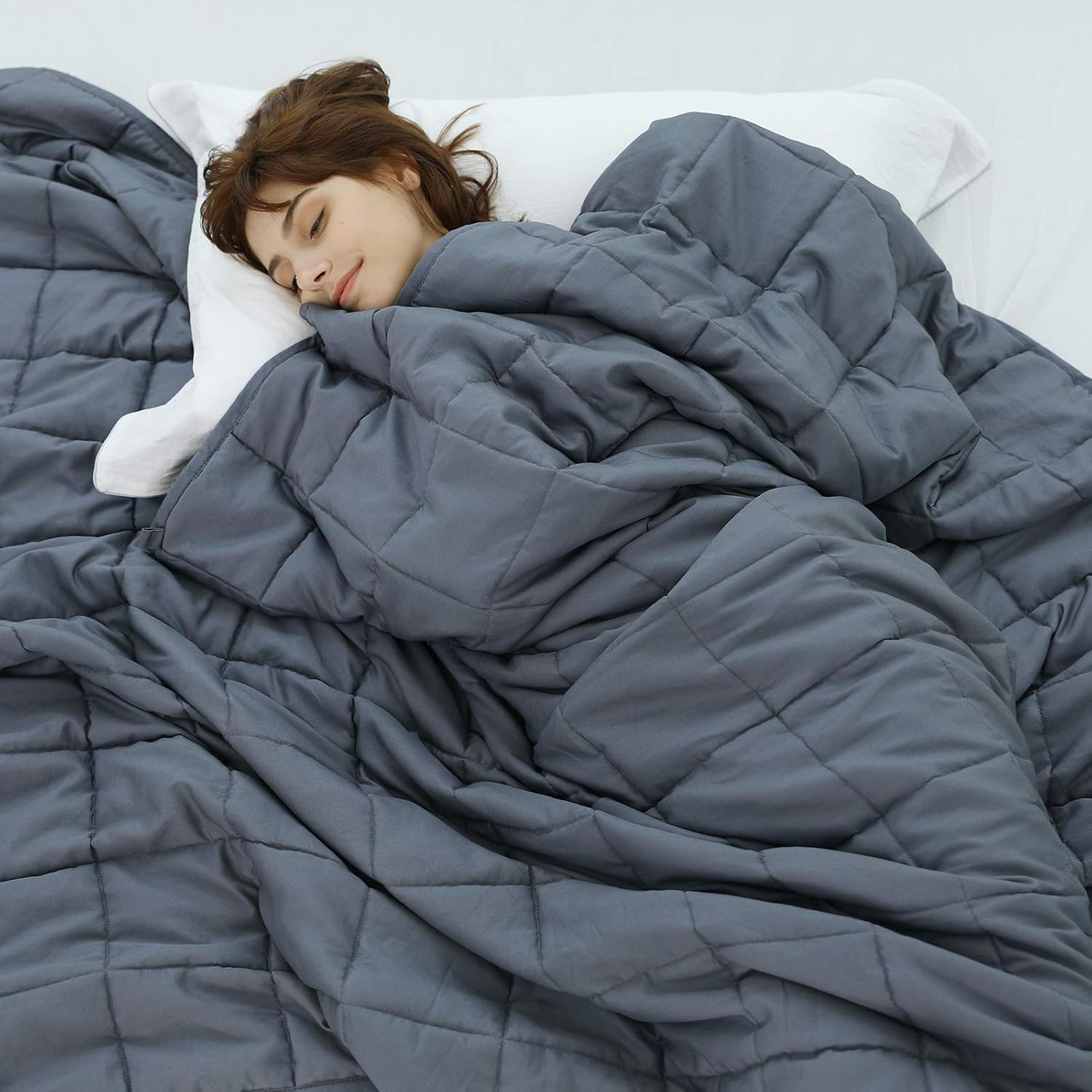 Cooling weighted blanket designed for deeper sleep, reduced anxiety, and improved nighttime comfort.